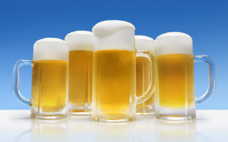 Cold beers on a blue background