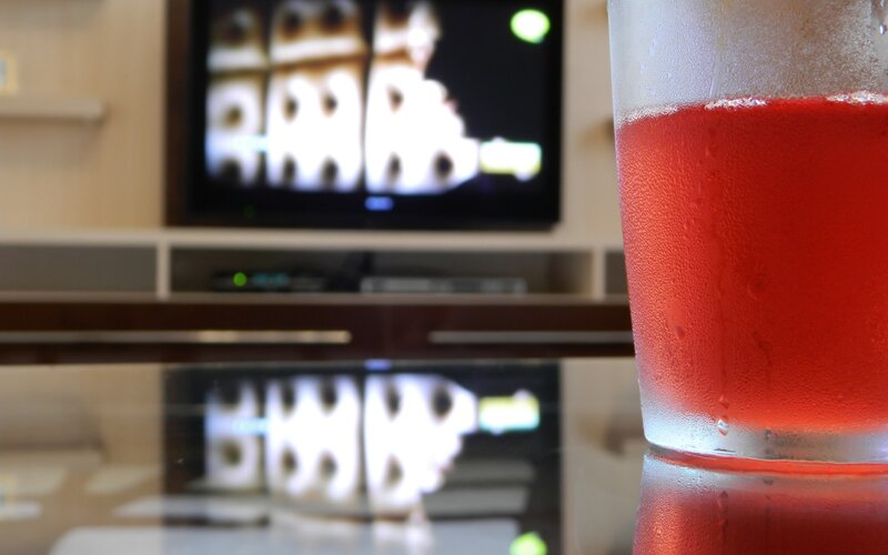 cold drink in front of TV