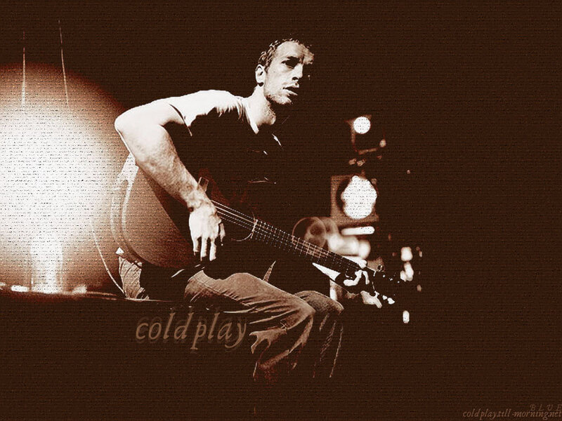 Coldplay musician performing live