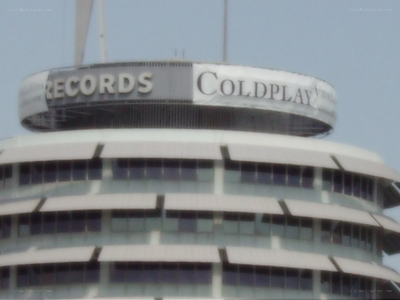 Coldplay sign on building