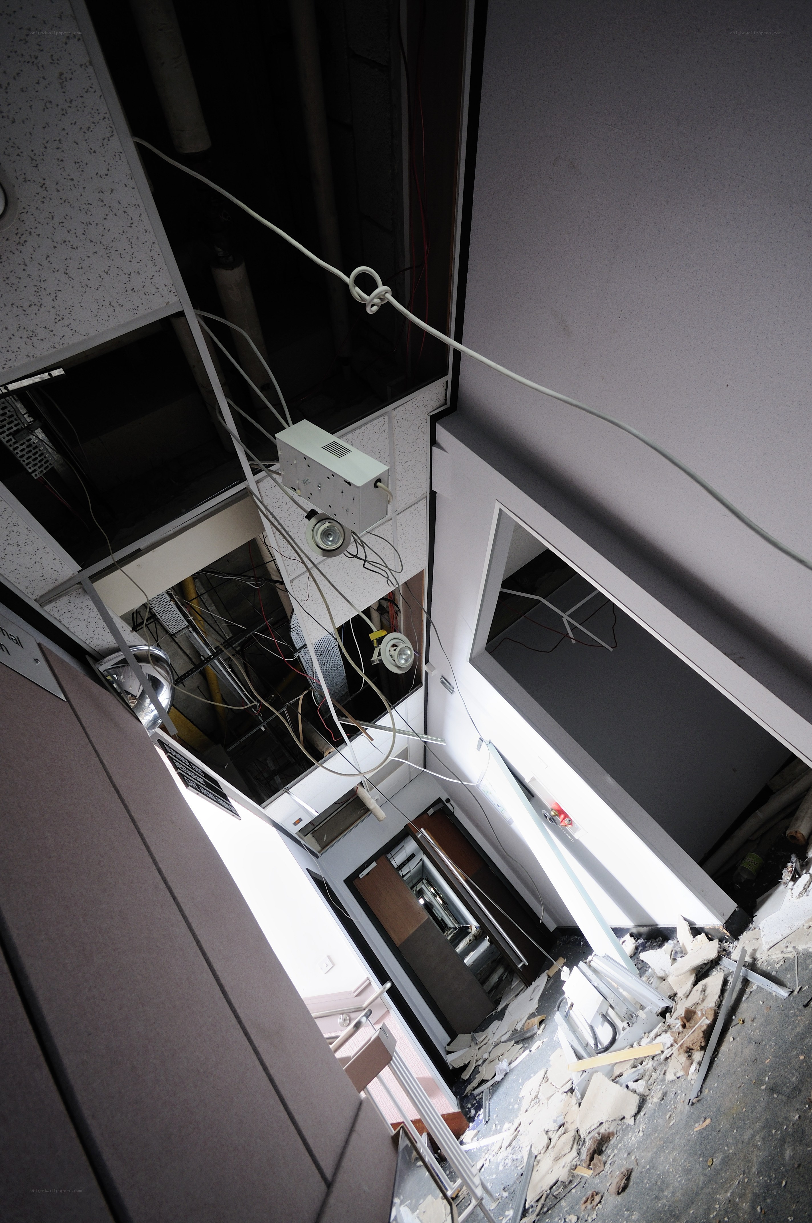 collapsed ceiling with exposed wiring