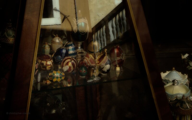 collection of decorative eggs in display case