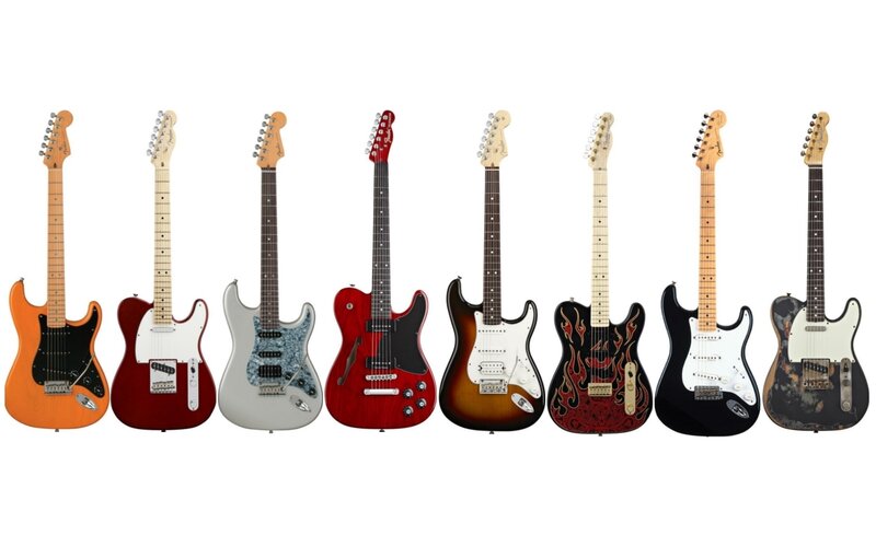 collection of electric guitars