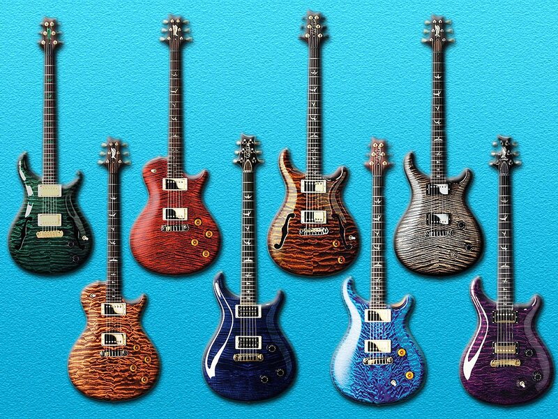 collection of electric guitars