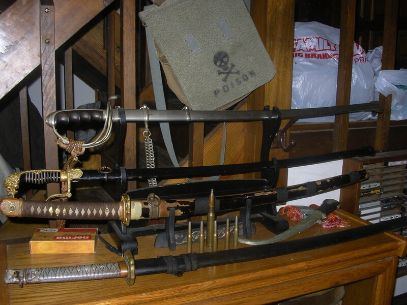 collection of swords and blades