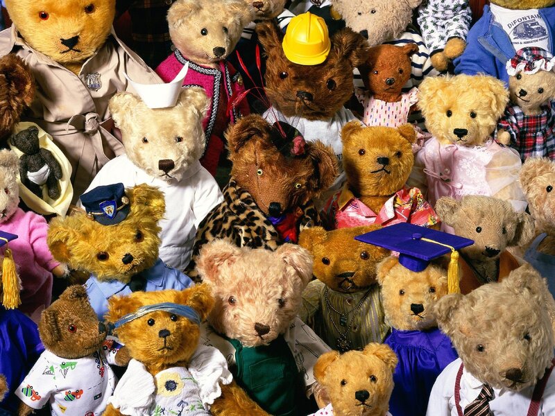 collection of teddy bears in costumes