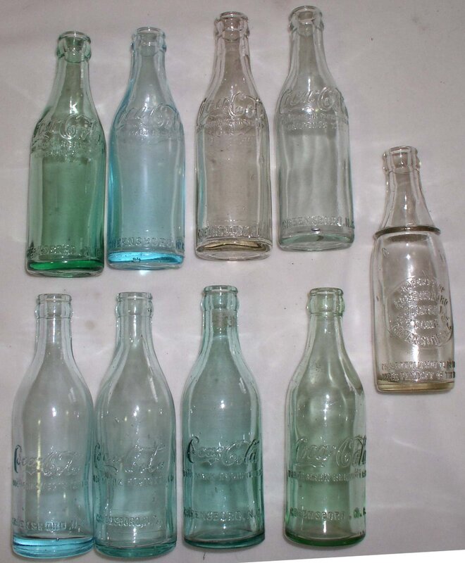 collection of vintage coca-cola bottles