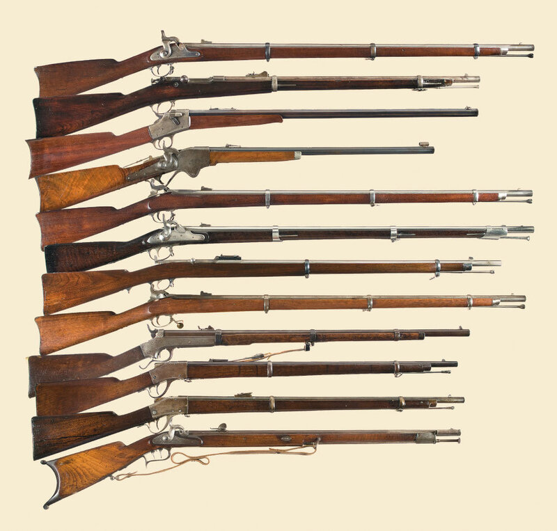 collection of vintage rifles