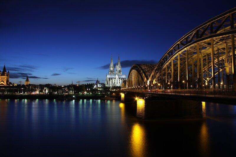 Cologne at night with cathedral and bridge