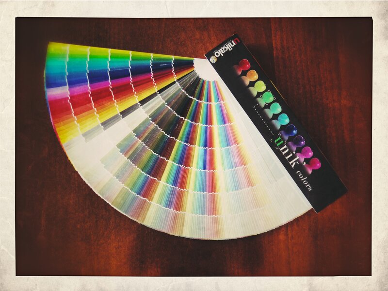 Color swatch fan on wood