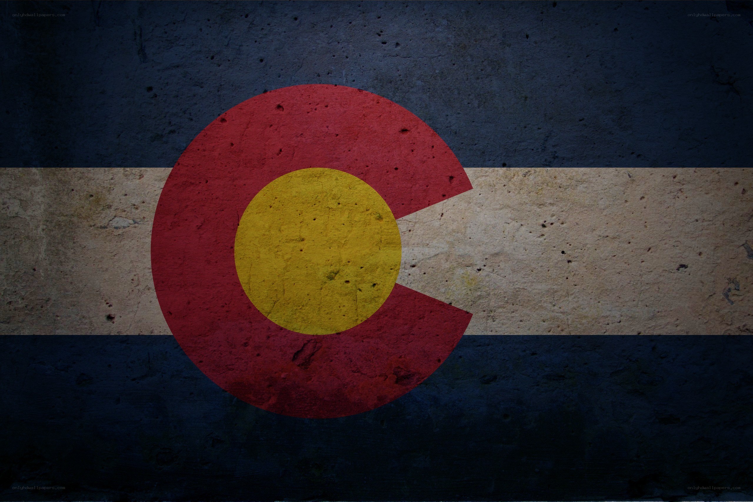 Colorado state flag on textured wall