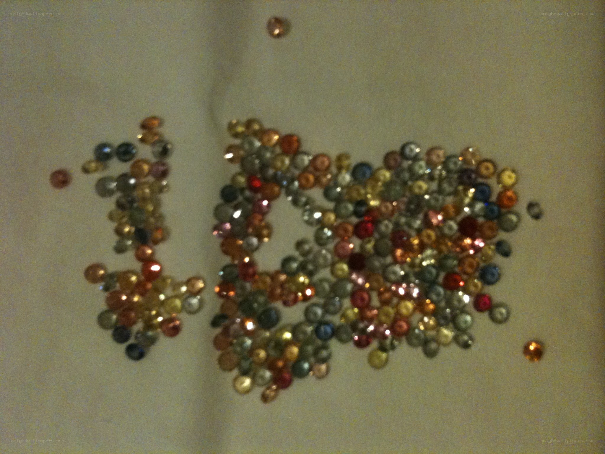colored beads arranged as 100