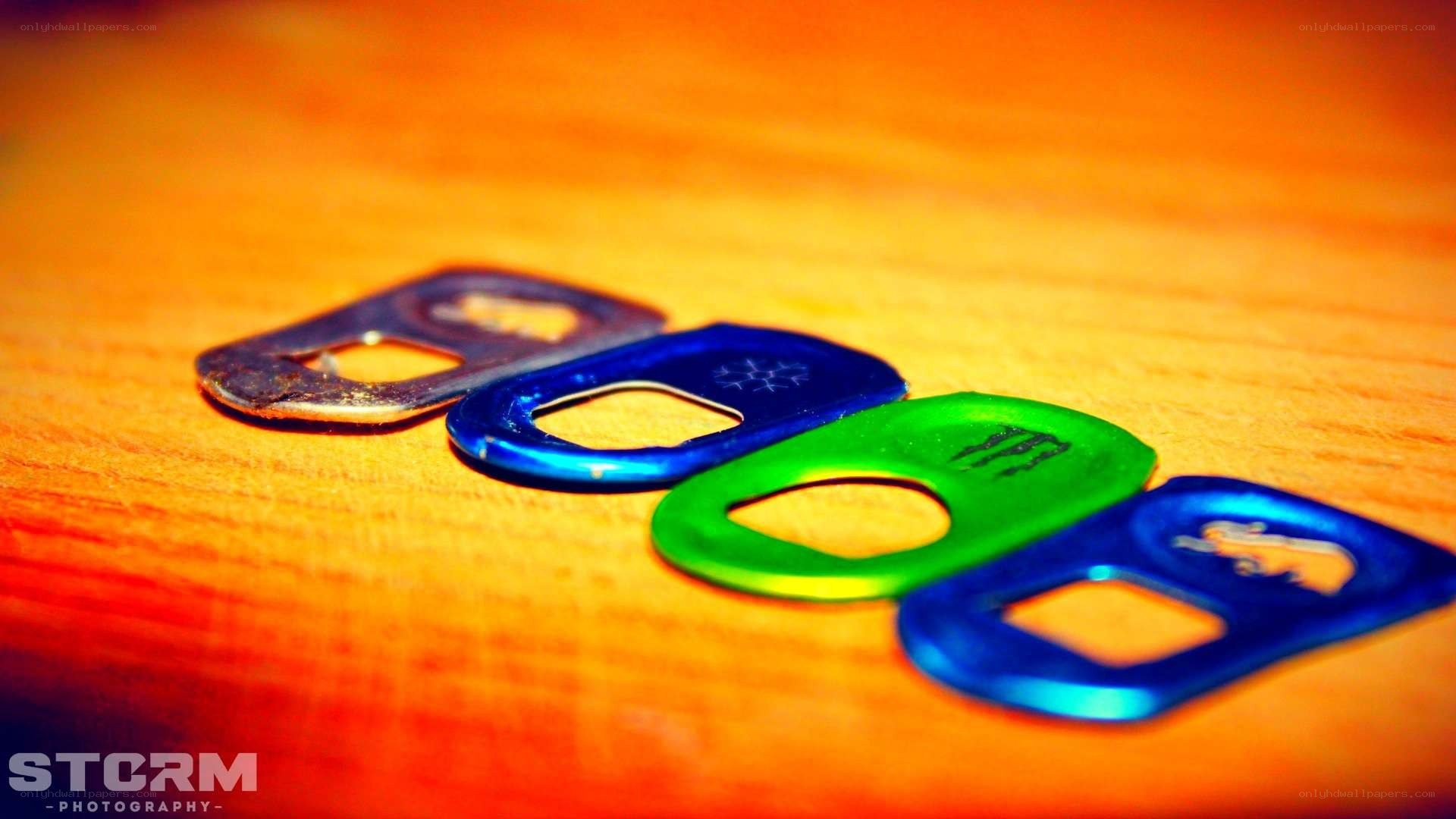 Colored can tabs on wood
