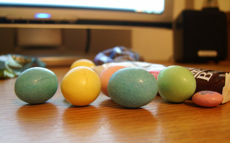 colored eggs on a table