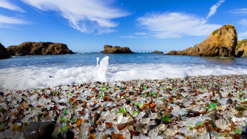 Colored Glass Pebbles on Beach