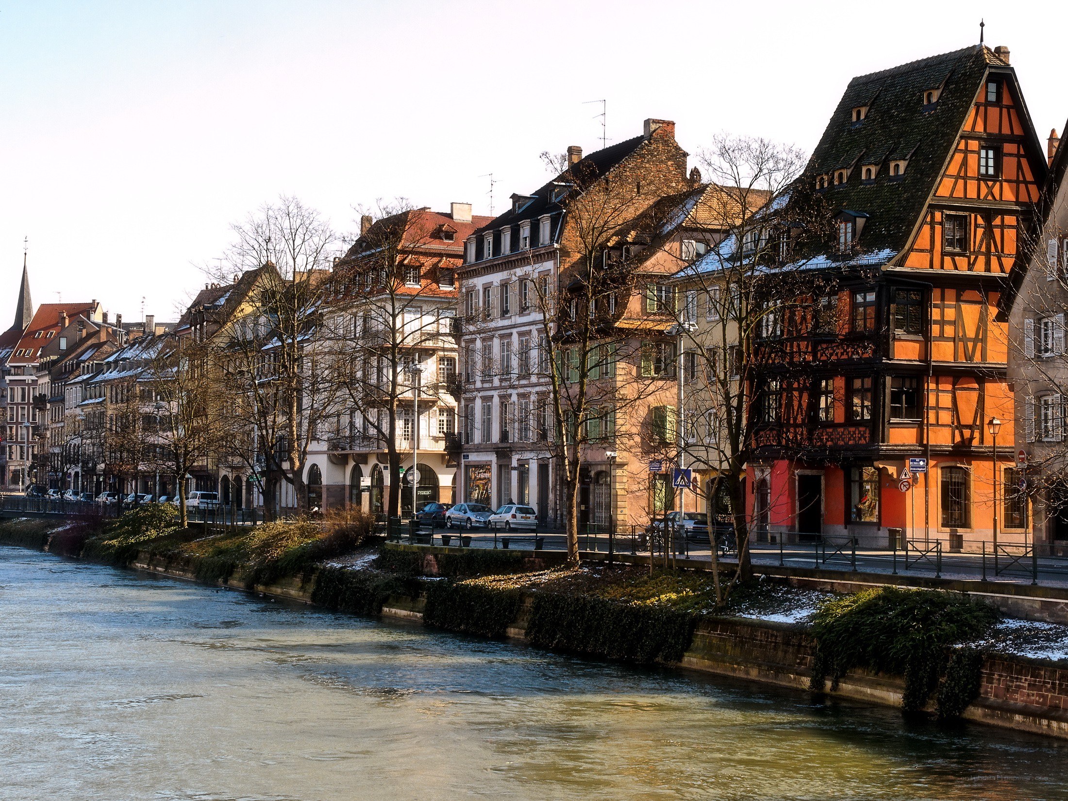 Colored houses along a river