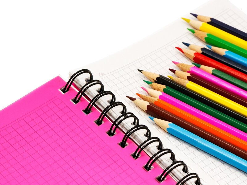 colored pencils and notebook