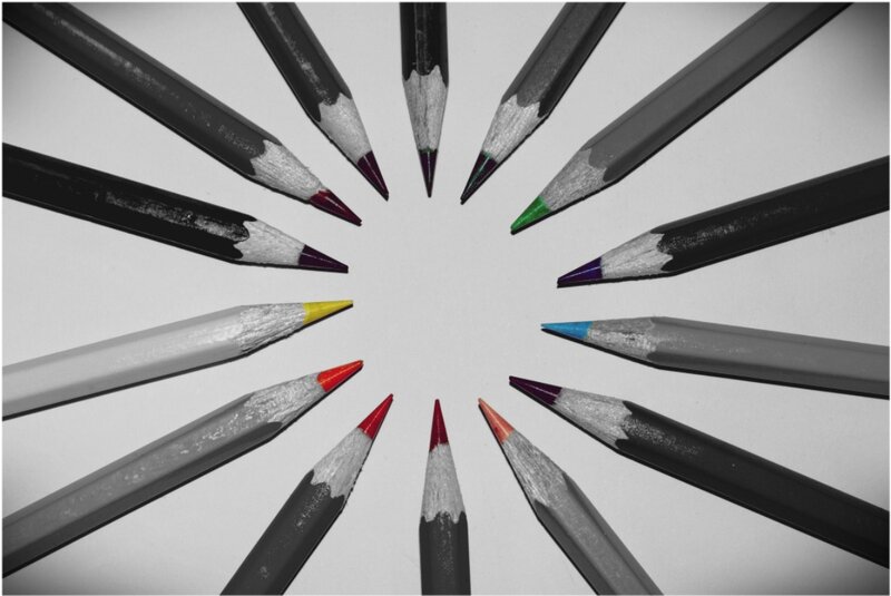 Colored Pencils Arranged in Circle — Black