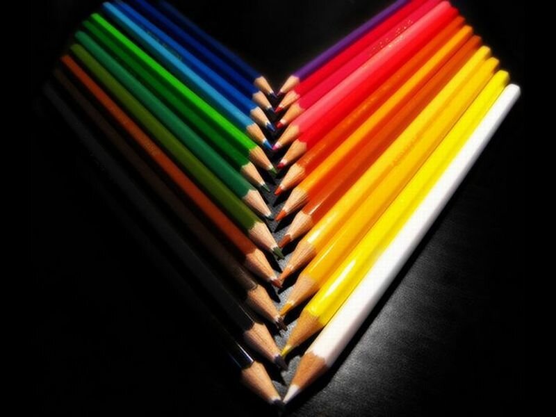 Colored Pencils Arranged in Heart
