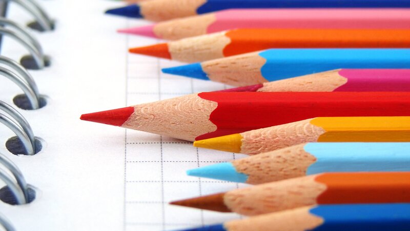 Colored Pencils on Notebook — Red, Calm