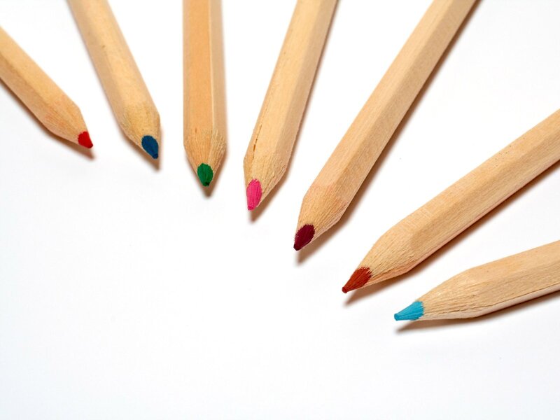 colored pencils on white background