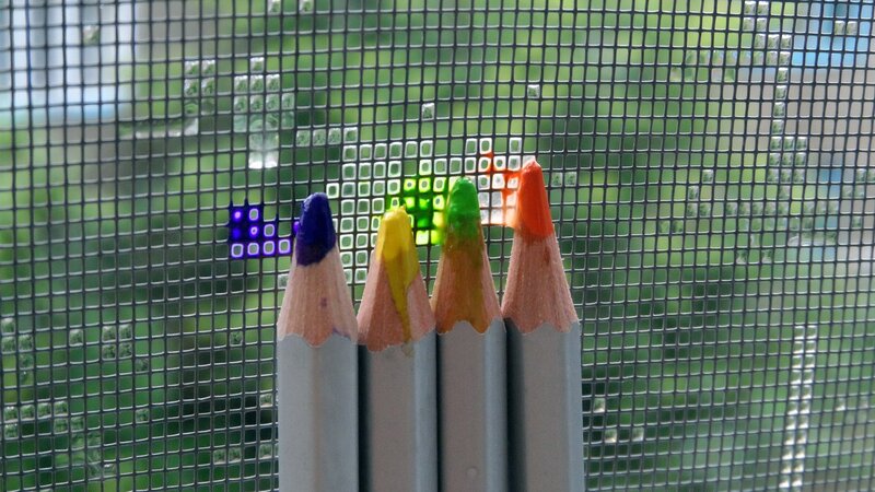 Colored pencils through mesh