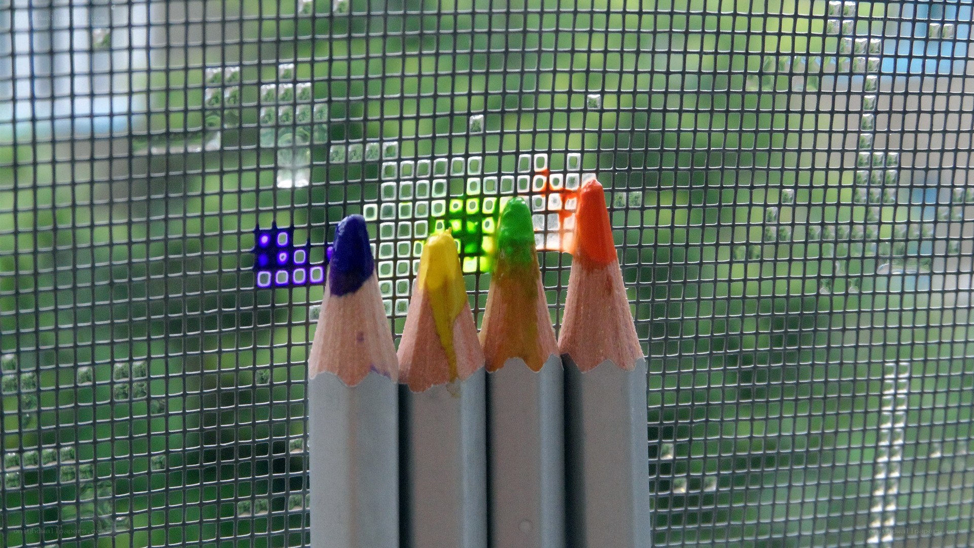 Colored pencils through mesh
