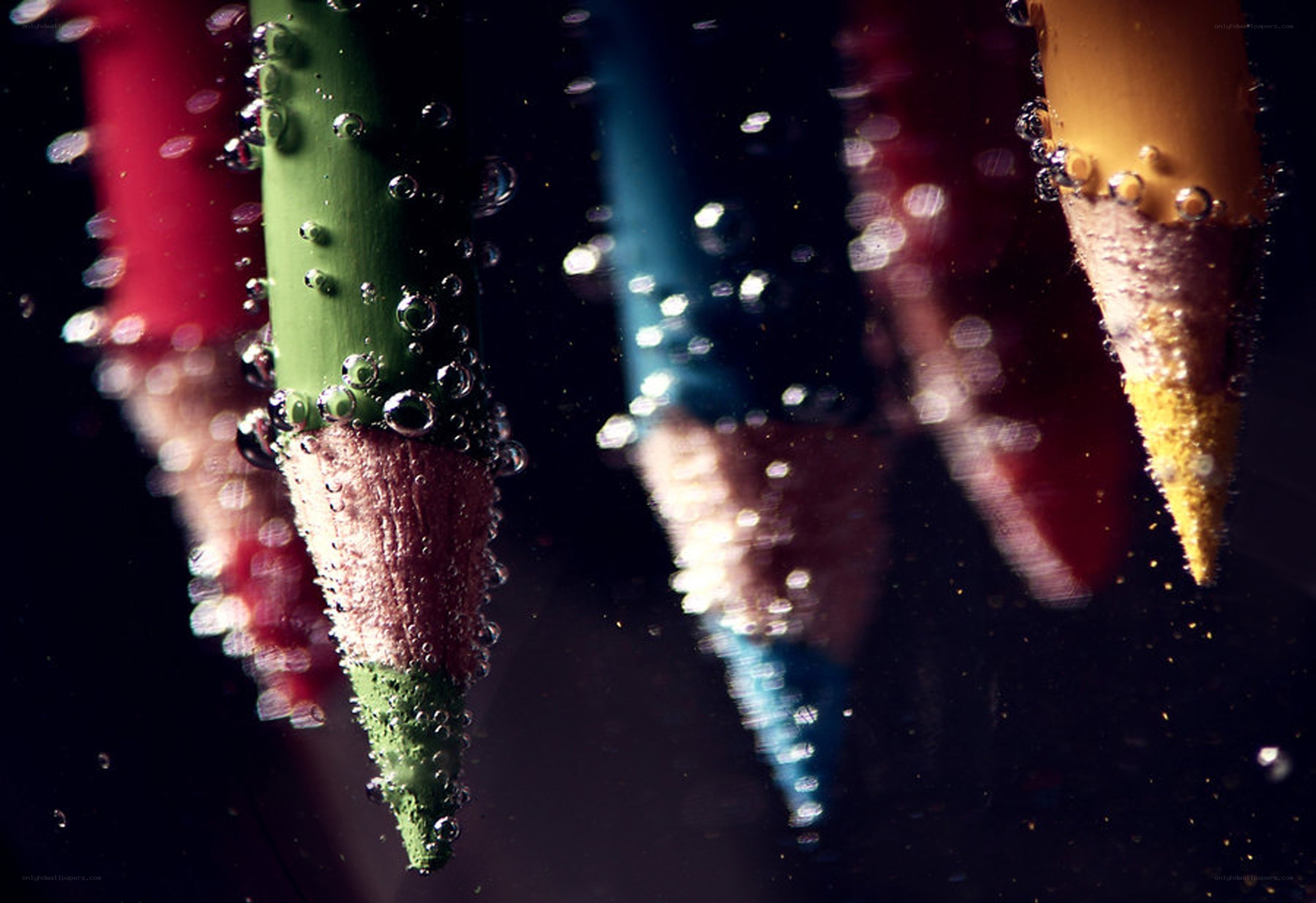 Colored pencils underwater