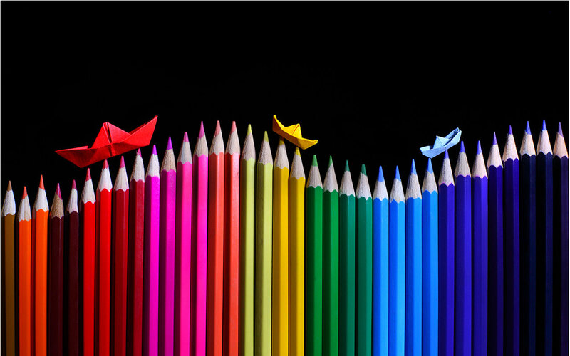 Colored Pencils with Paper Boats