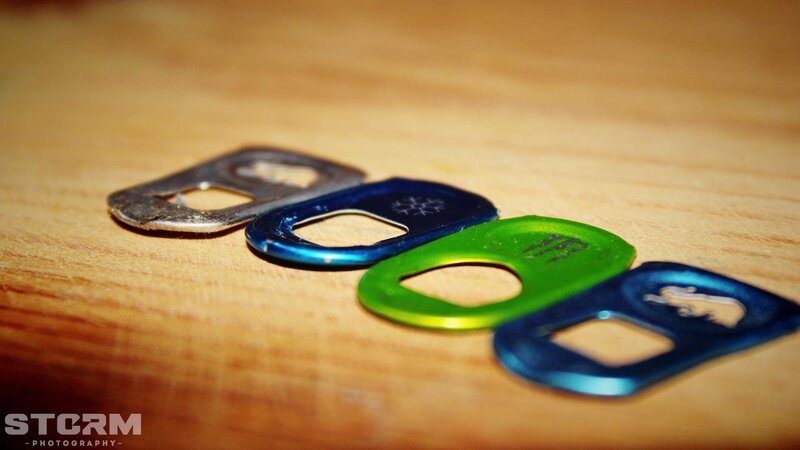 colored pull tabs on wood