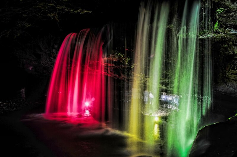 Colored Waterfall at Night — Red, Dramatic