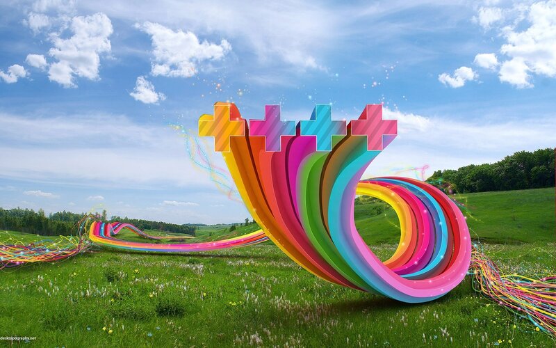 Colorful abstract sculpture in field