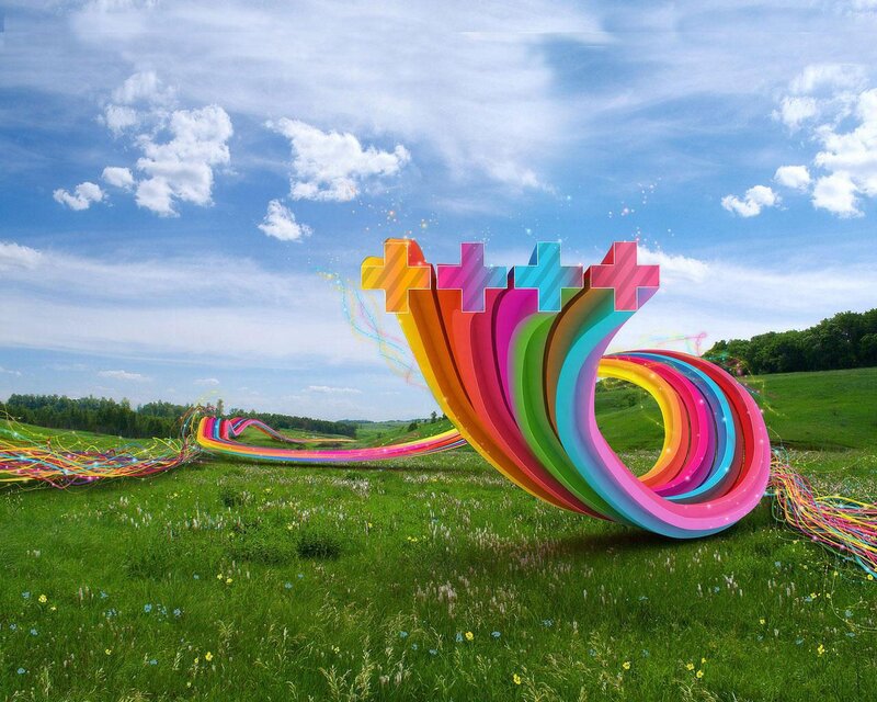 Colorful abstract sculpture in field