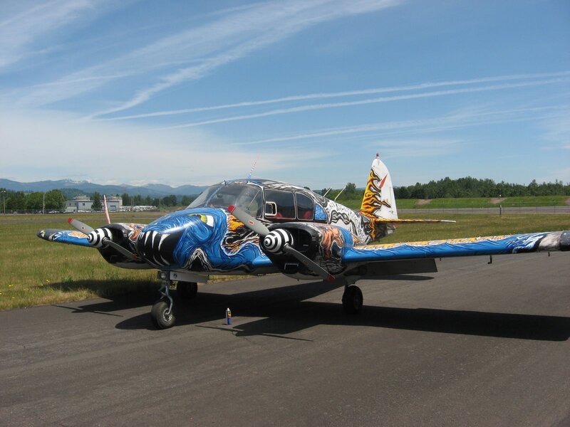 colorful airplane on tarmac