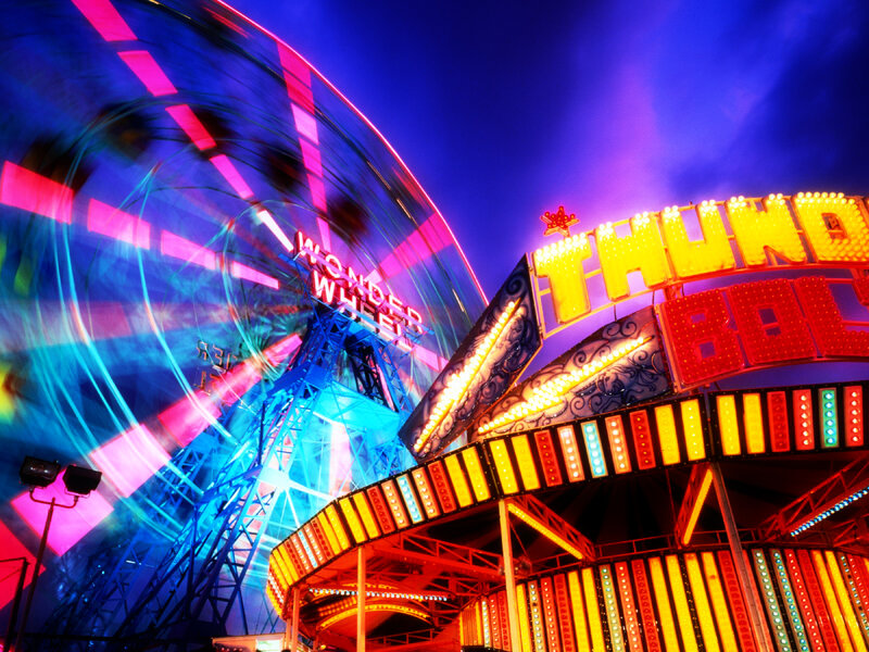 Colorful amusement park at night