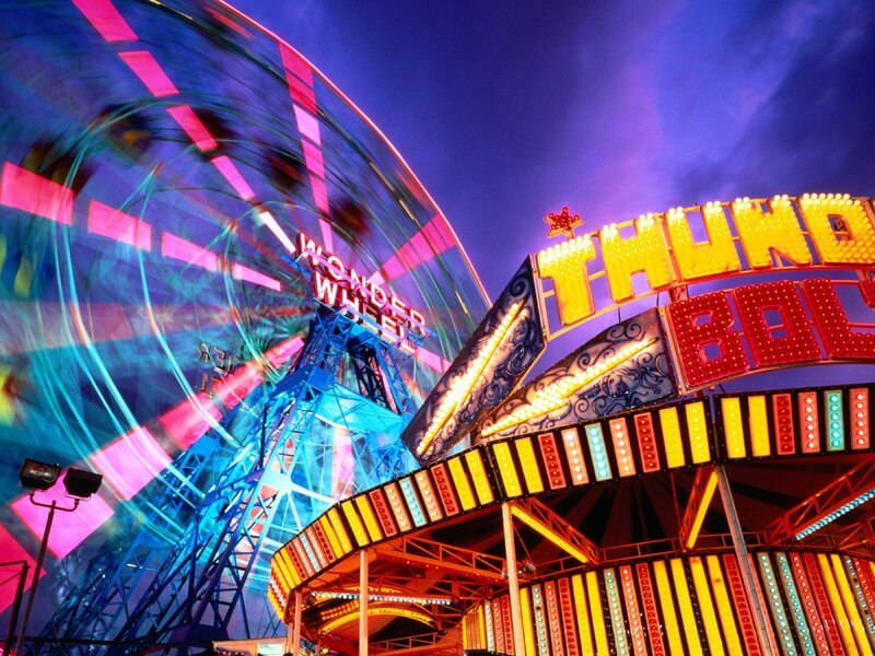 Colorful amusement park at night