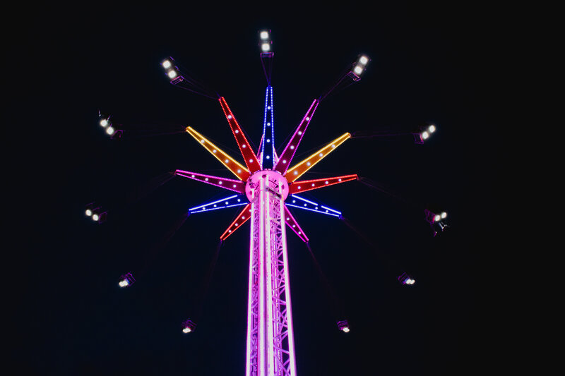 Colorful amusement ride at night