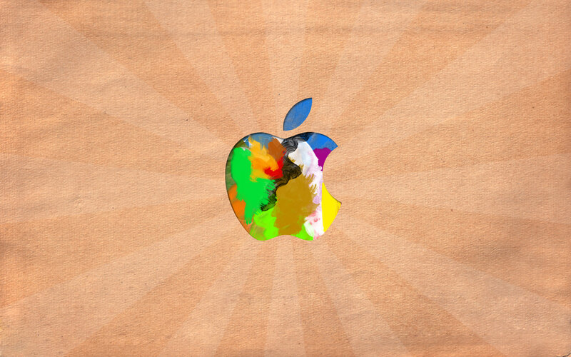 Colorful Apple logo on wood