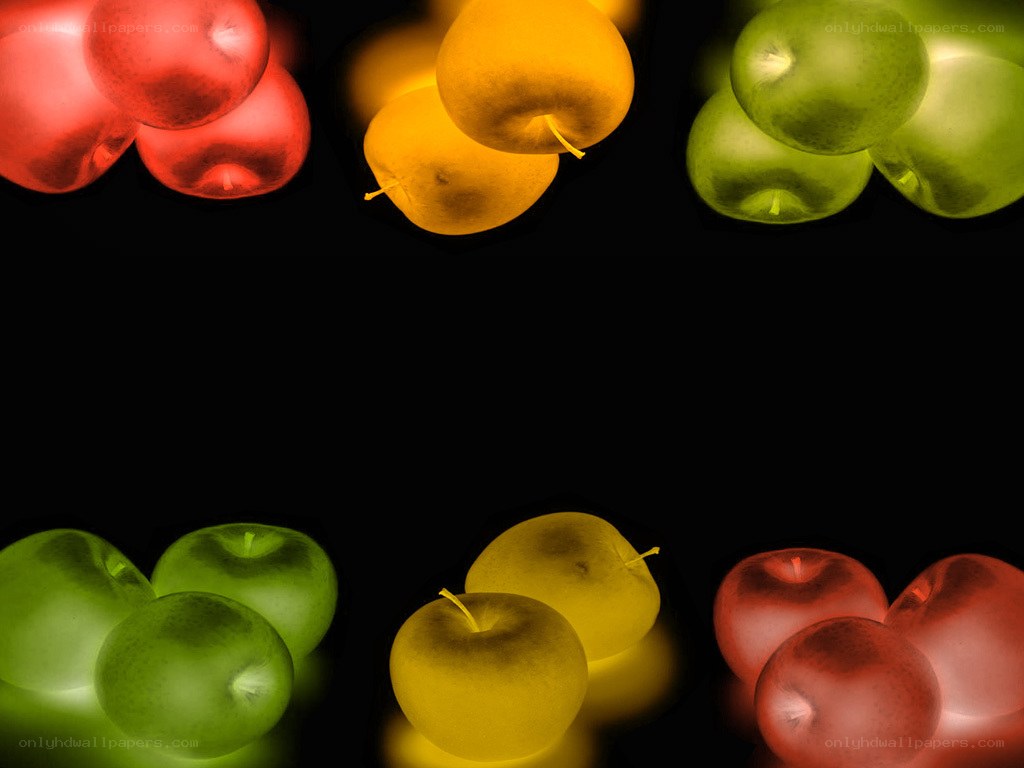 colorful apples on black background