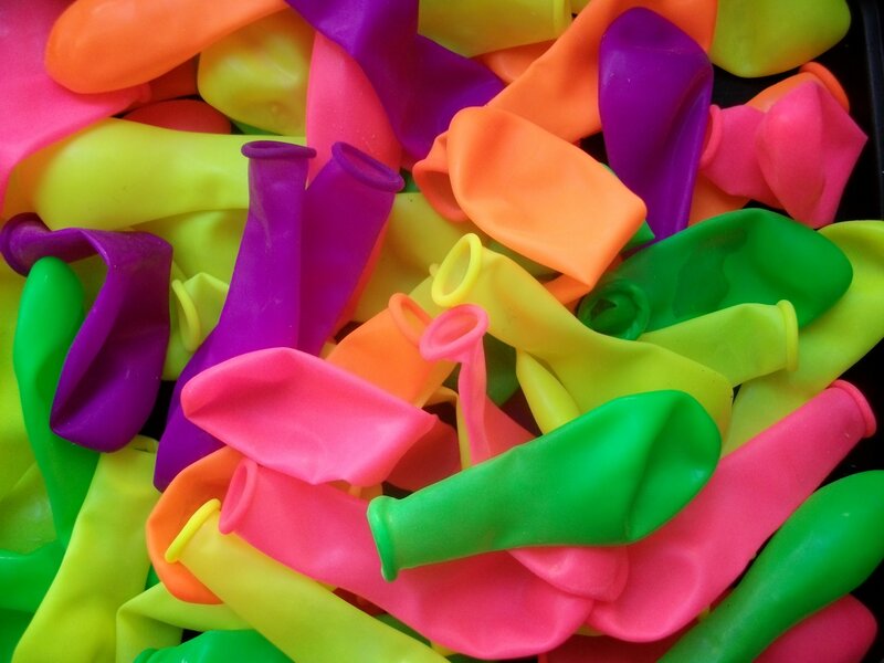 Colorful balloons in a pile