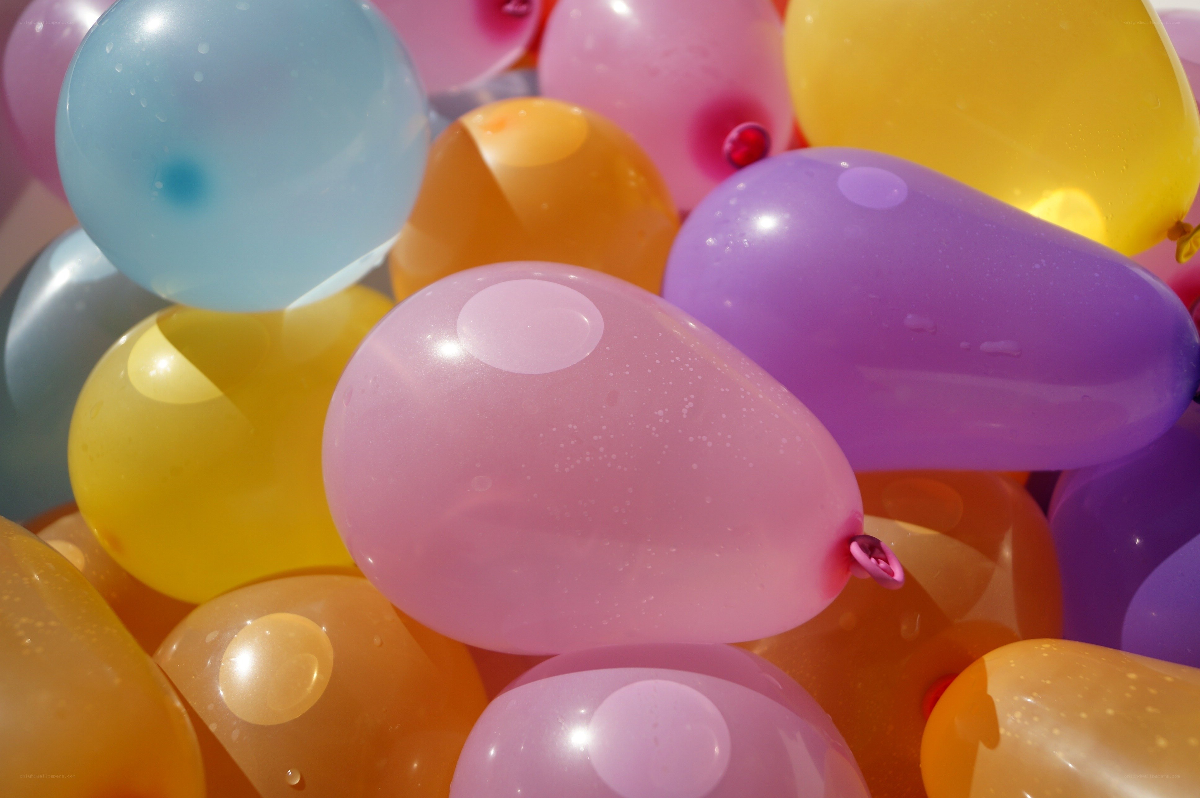 Colorful balloons in a pile