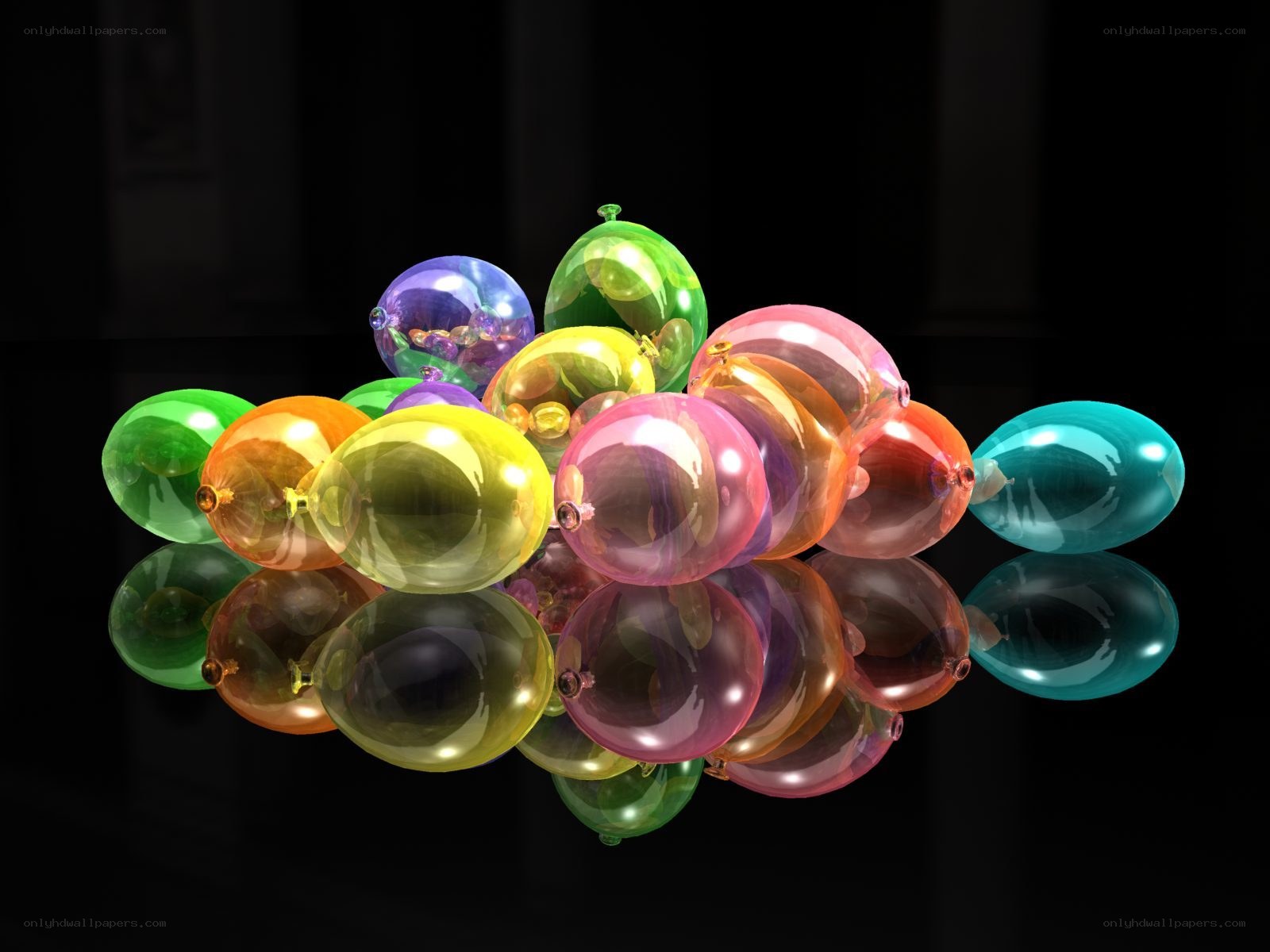 Colorful balloons on black surface