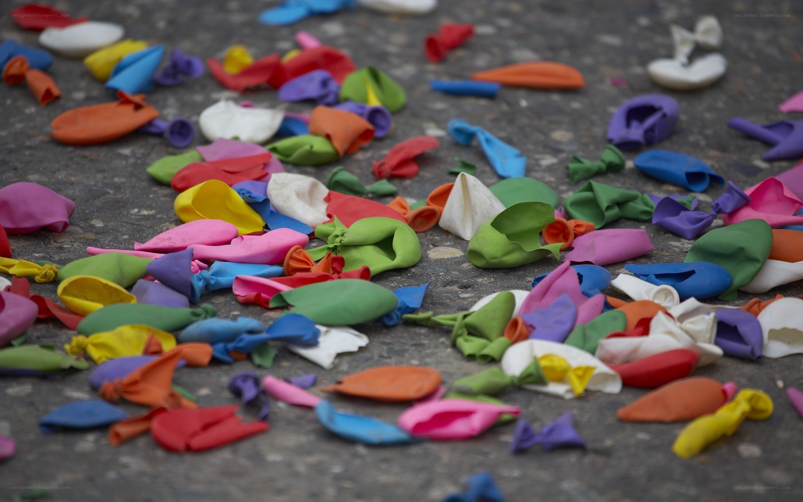 Colorful balloons on pavement