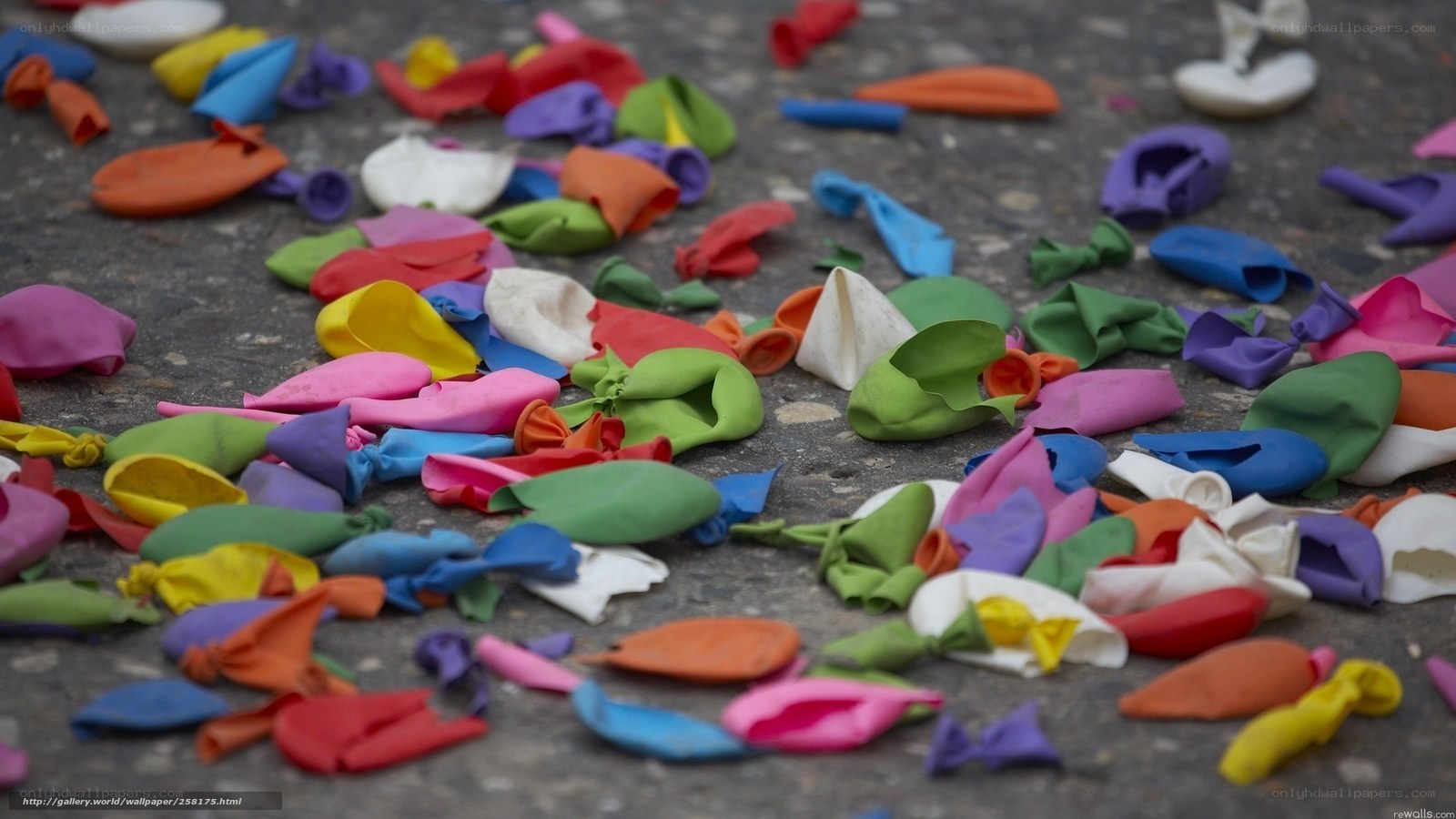 Colorful balloons on pavement