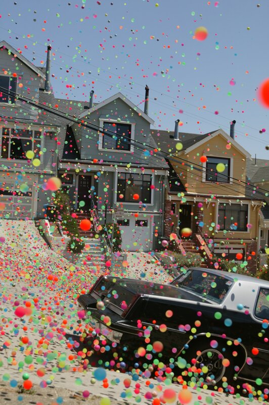 Colorful balls fill a residential street