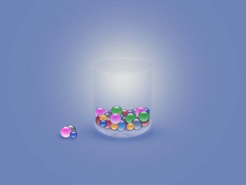 Colorful balls in a glass