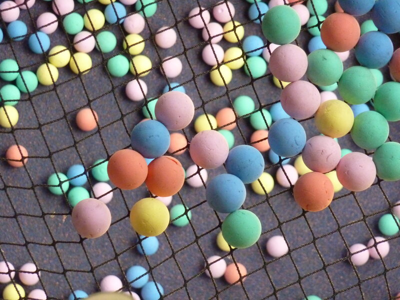 Colorful balls on a net
