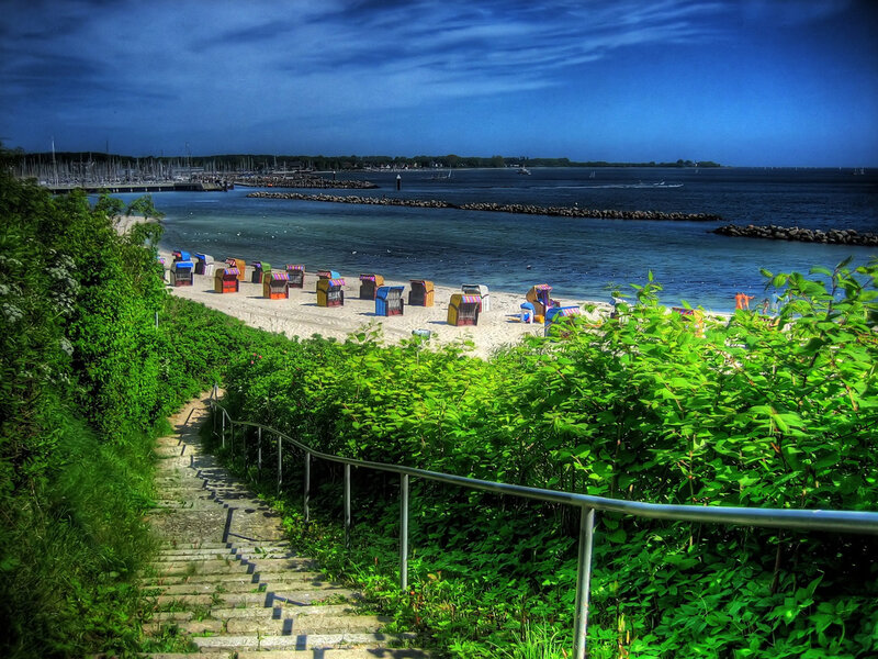 Colorful beach huts by the sea