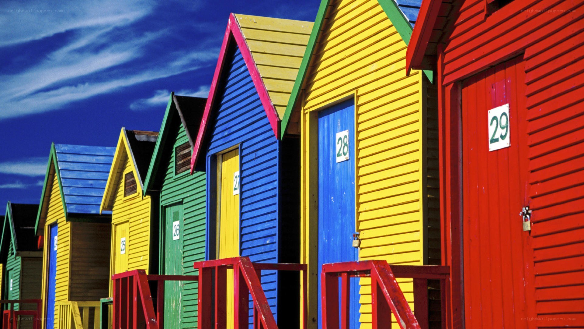 Colorful beach huts in a row