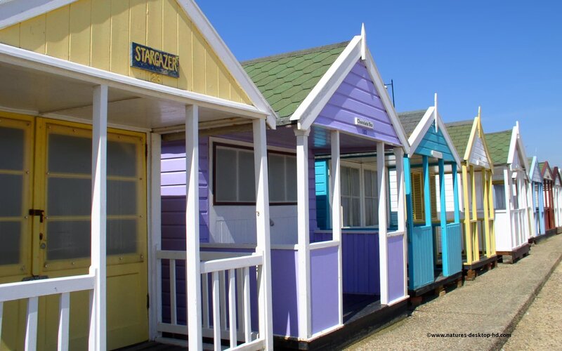Colorful beach huts in a row
